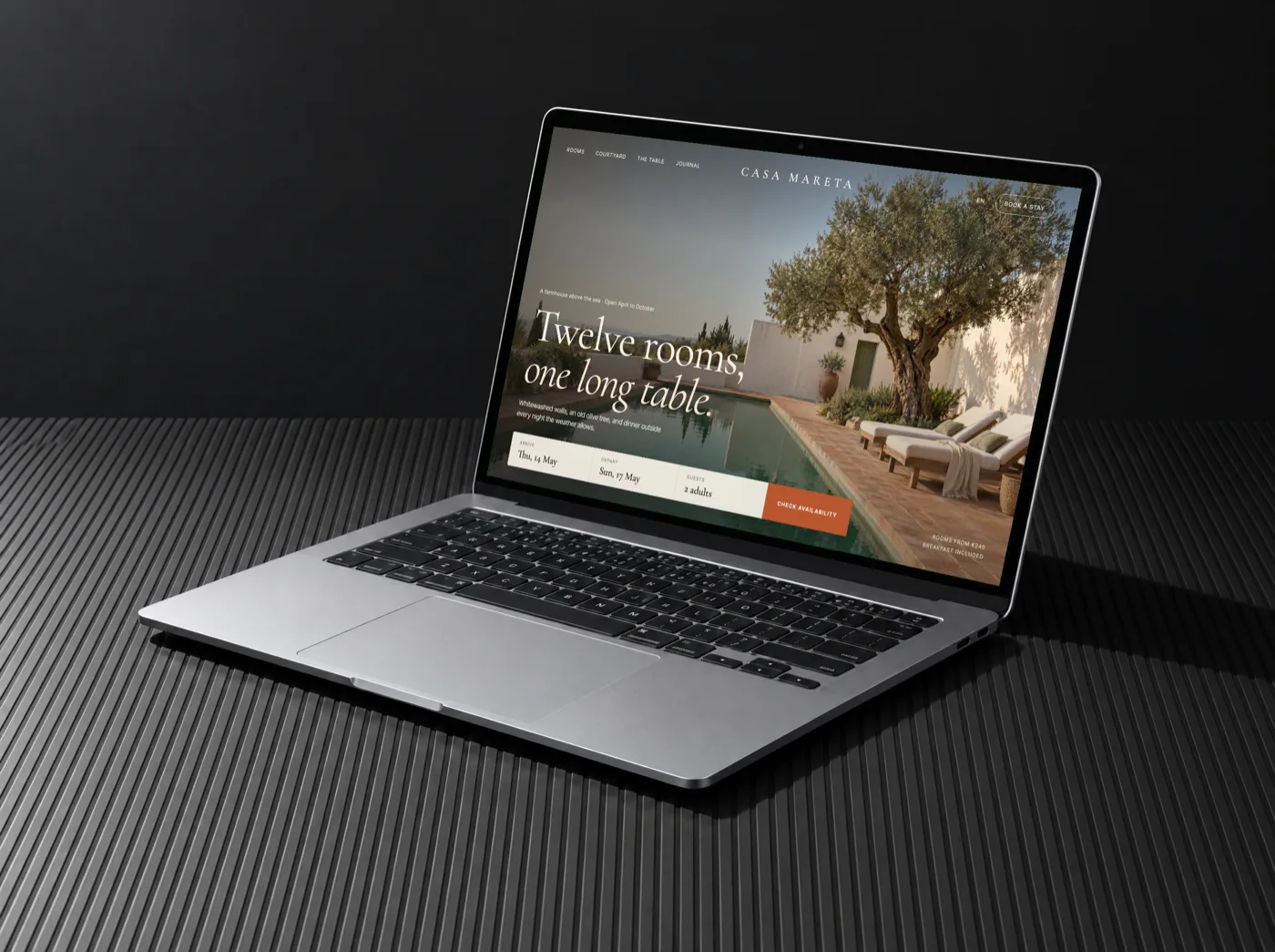 Casa Mareta, a hotel concept we designed, open on a laptop
